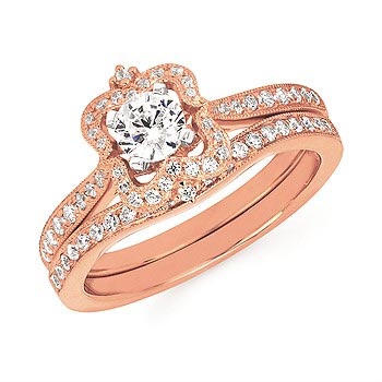 rose gold engagement ring and band with diamonds