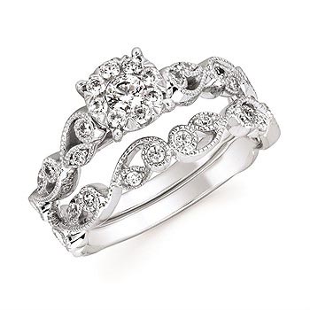 white gold engagement ring and band with diamonds