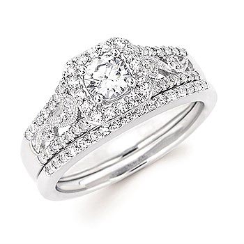 white gold engagement ring and band with lots of diamonds and large center diamond